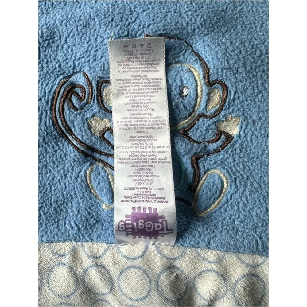 Taggies Blue Monkey Baby Blanket with Light Blue Dot Border